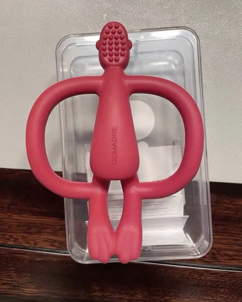 GDMADRE baby chew, match monkey baby teether, baby bite soothing molar stick soft silicone teething toy, ruby red