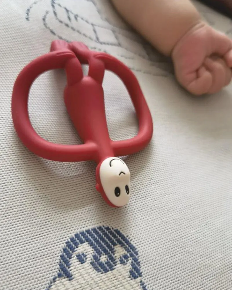 GDMADRE baby chew, match monkey baby teether, baby bite soothing molar stick soft silicone teething toy, ruby red