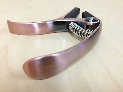Haze DC06B Top Grade Zinc Alloy Acoustic/Classical Guitar Capo - Bronze   3 Free Picks