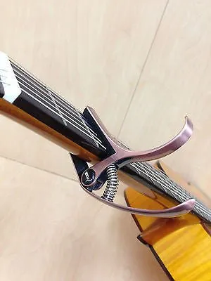 Haze DC06B Top Grade Zinc Alloy Acoustic/Classical Guitar Capo - Bronze   3 Free Picks
